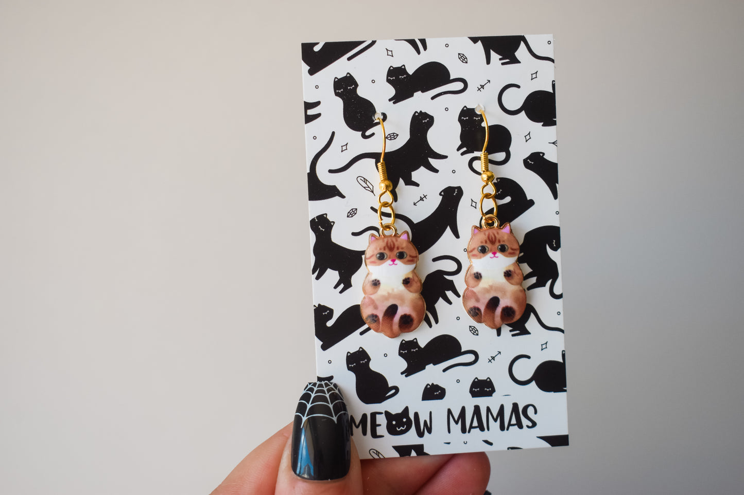 Kitty peets dangle earrings brown