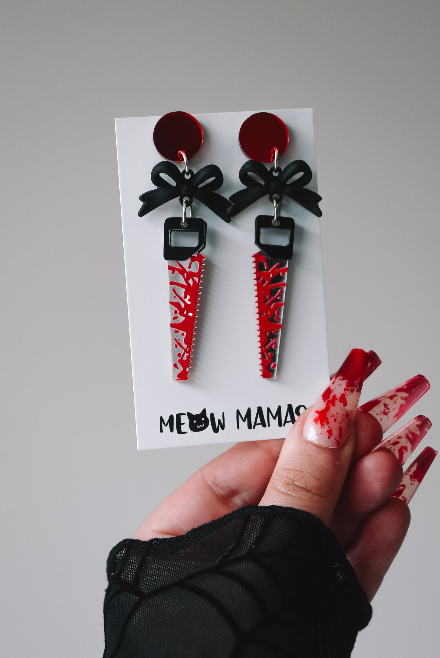 Final girl saw earrings