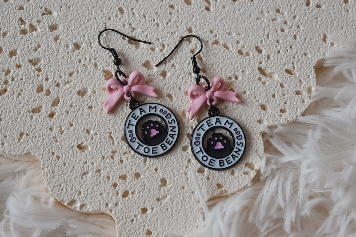 Team toe bean earrings