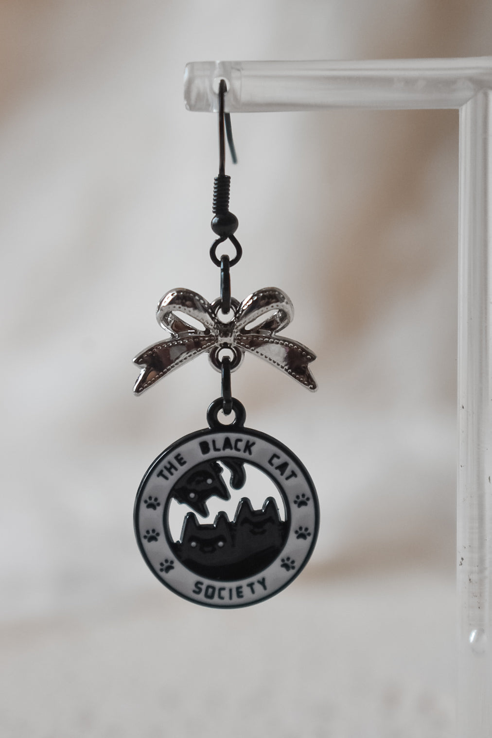 Black cat society earrings