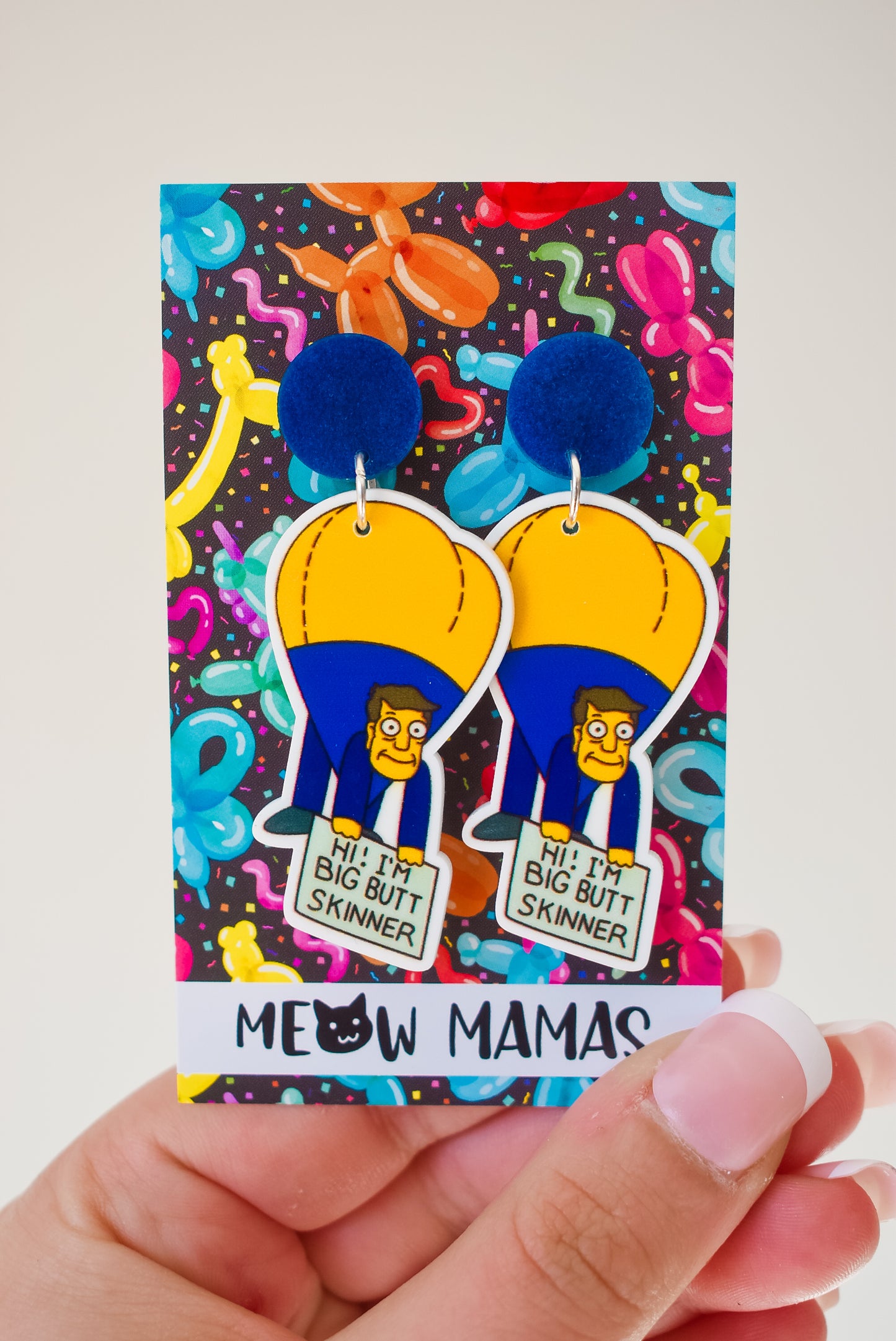 Big butt Skinner dangle earrings
