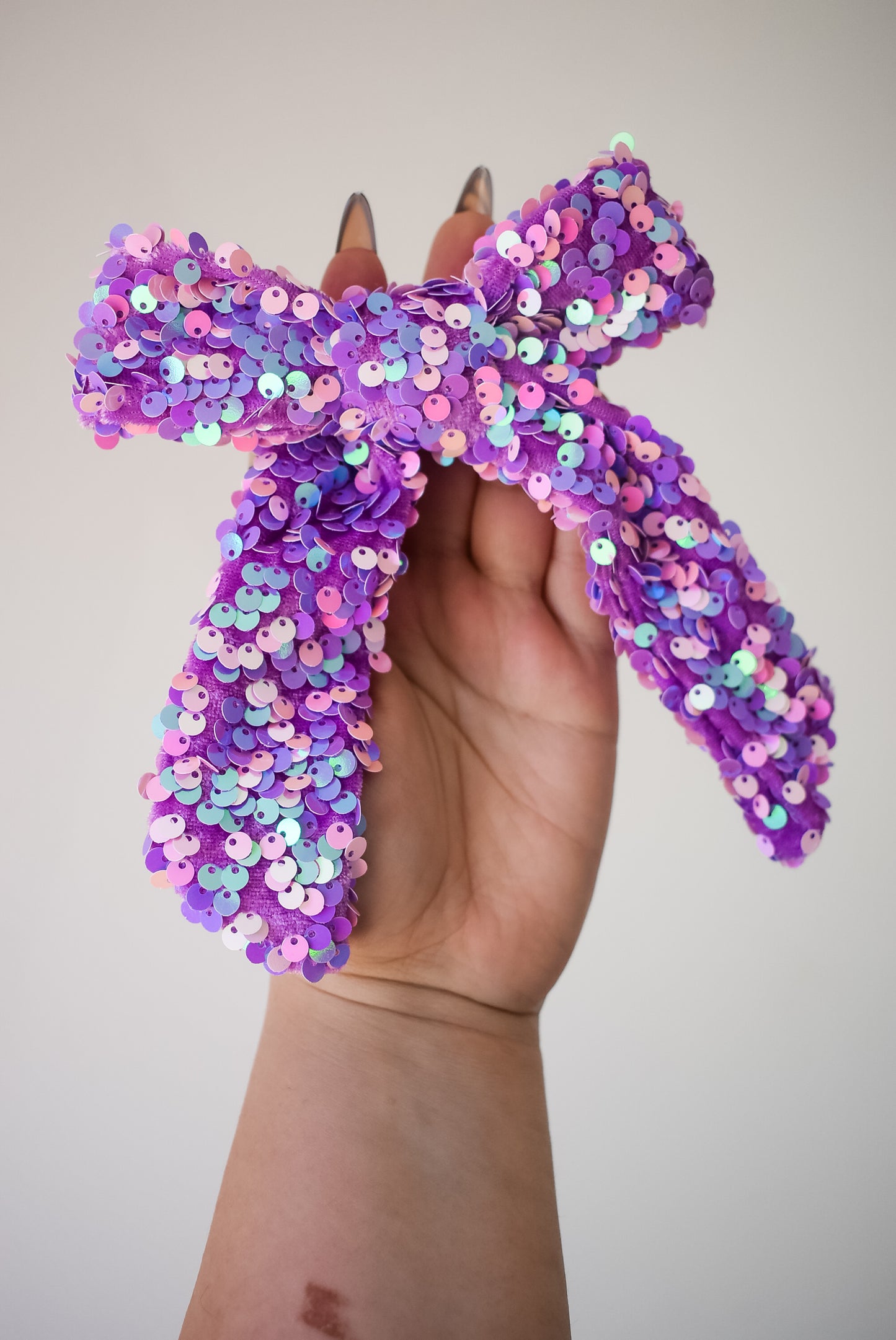 Sequin hand tied bow in colour mermaid