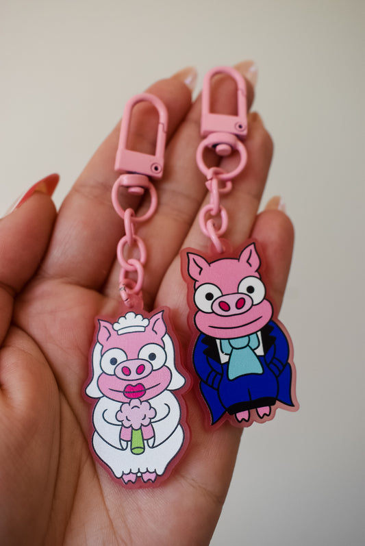Pig cuffling his and hers keychain set