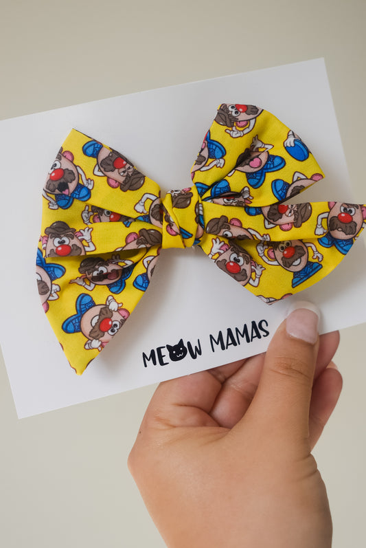 Yellow potato head Pinwheel bow