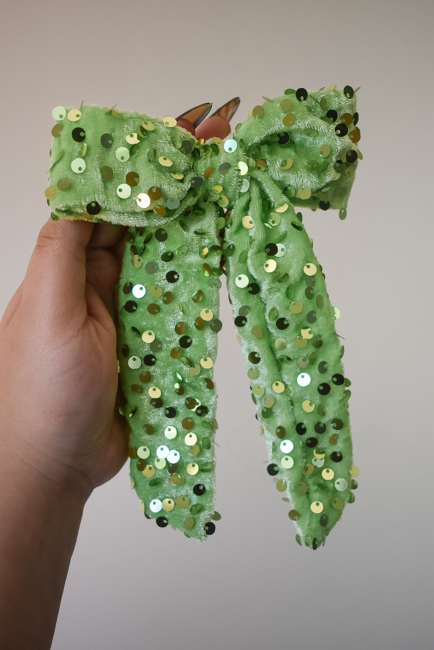 Sequin hand tied bow in colour Grinchish