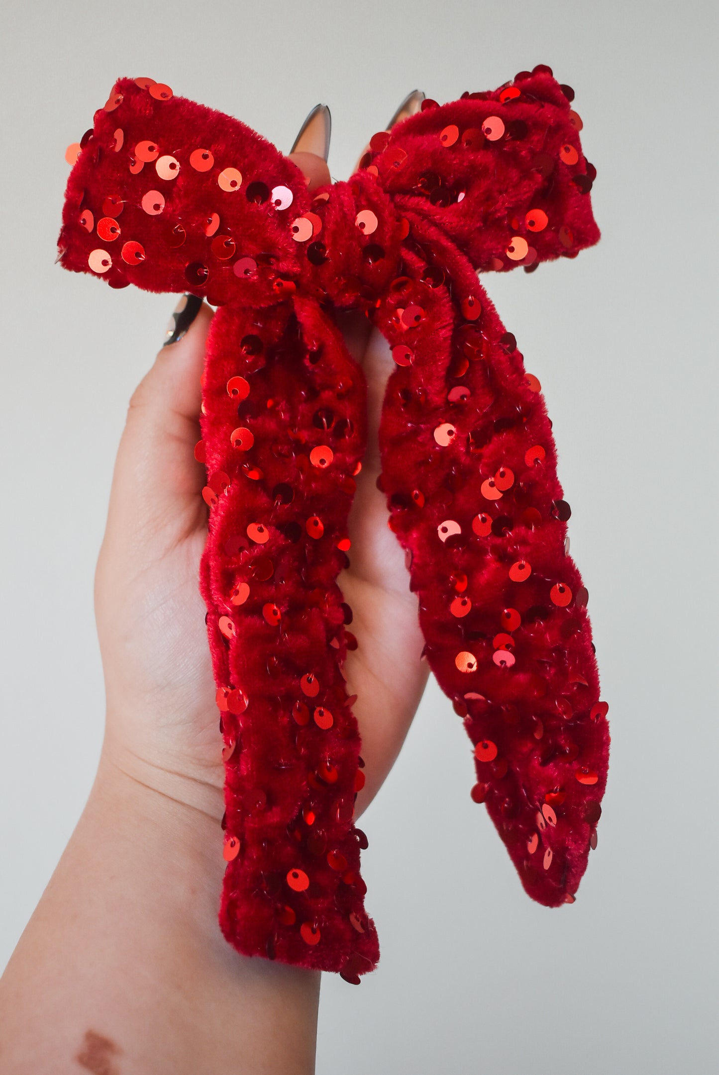 Sequin hand tied bow in colour Mariah