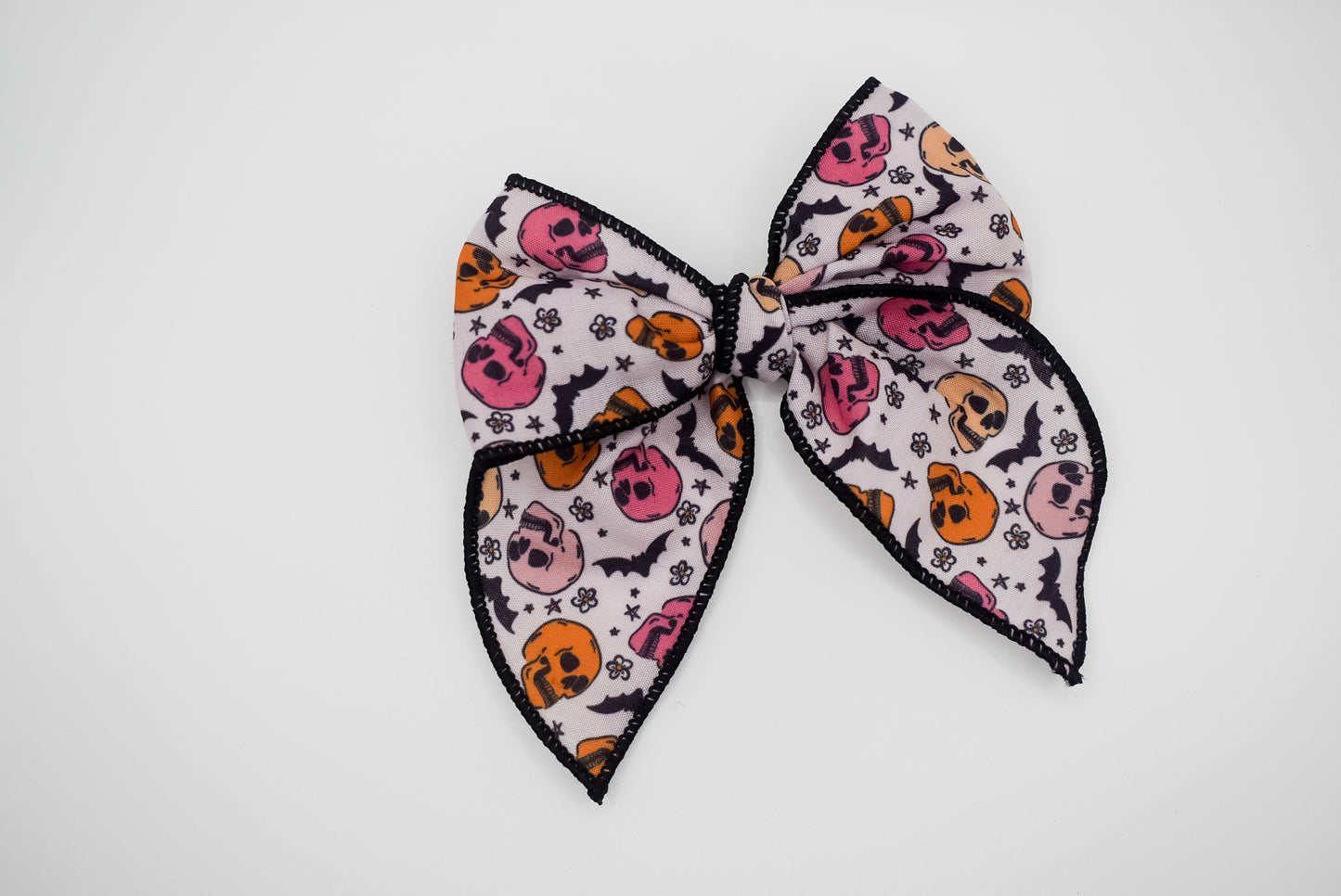 Muted skulls mini whimsical sailor bow