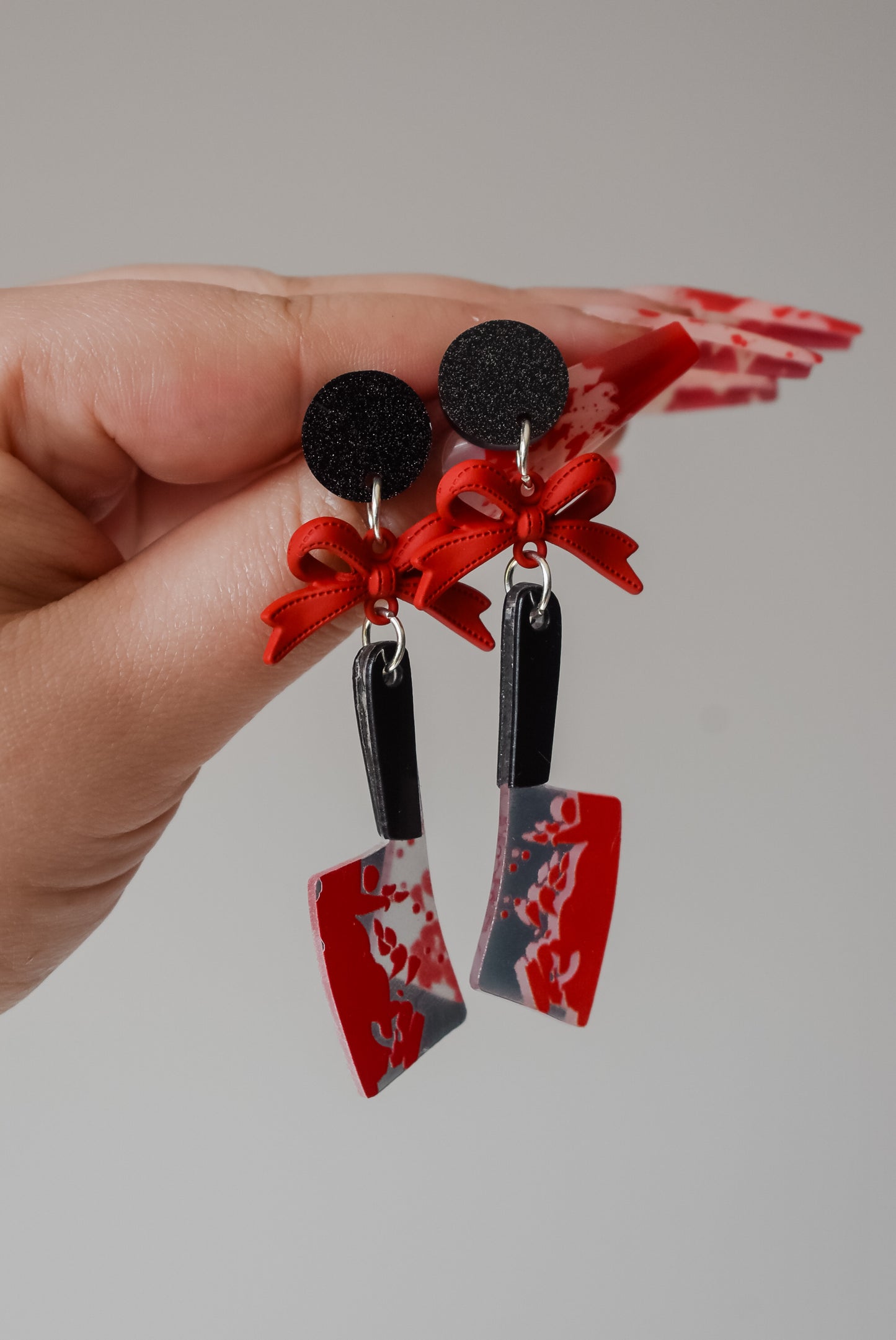 Final girl meat cleaver earrings