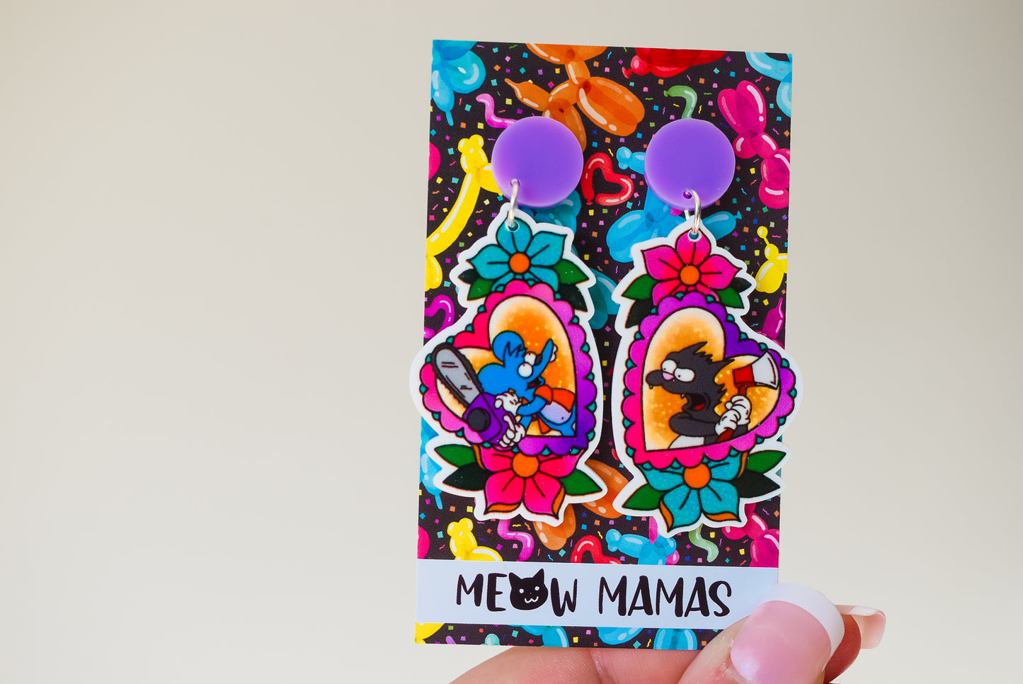 Itchy and scratchy dangle earrings