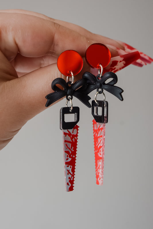 Final girl saw earrings