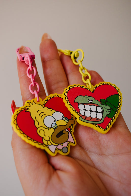Ow ! He bit me with my own teeth keychain set