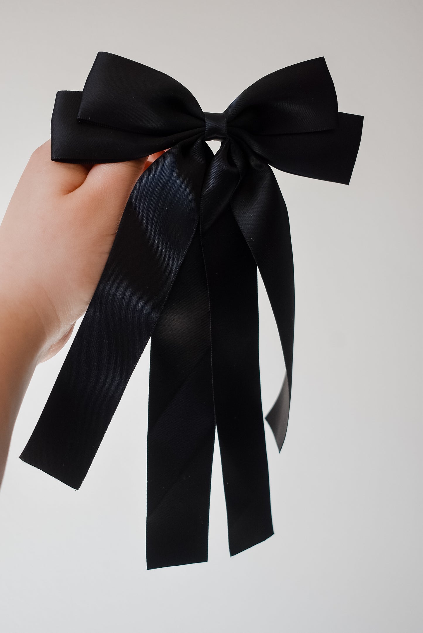 Black large ribbon bow