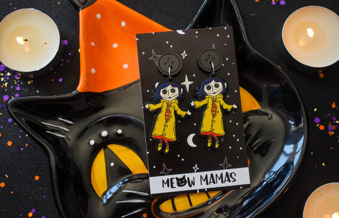 Button eye doll acrylic earrings