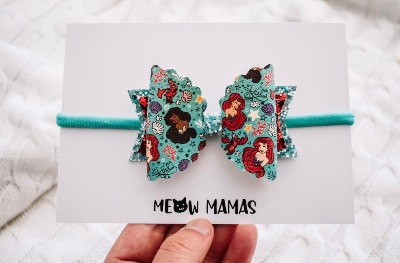 Inclusive mermaids teal bow