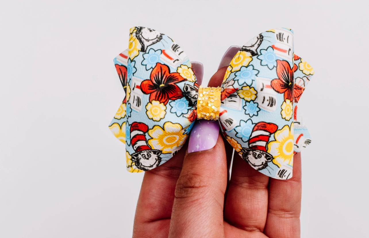 Rhyme cat pinch bow