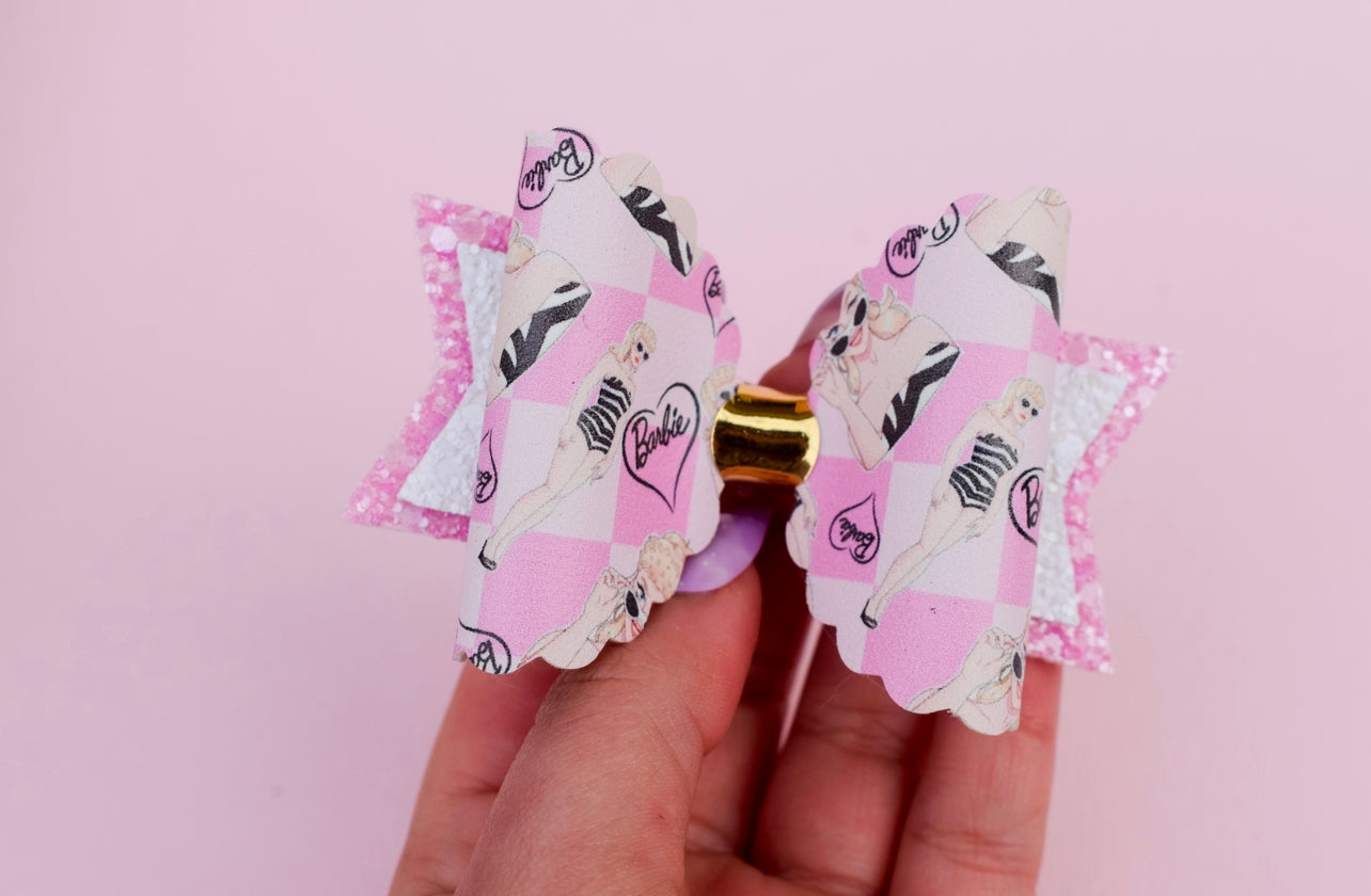 Classic swimsuit doll bow