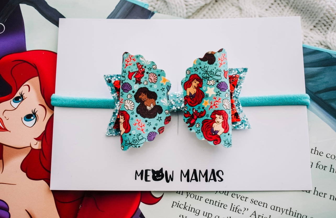 Inclusive mermaids teal bow