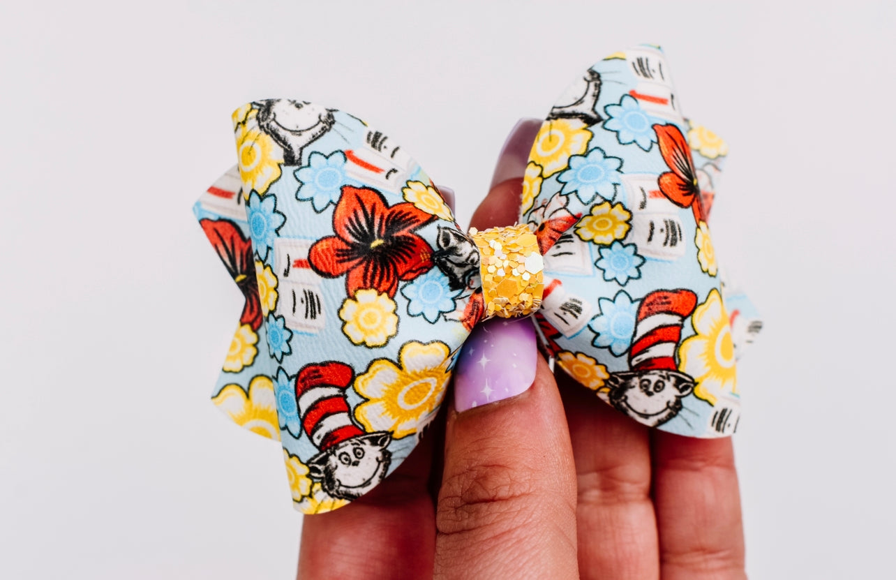 Rhyme cat pinch bow