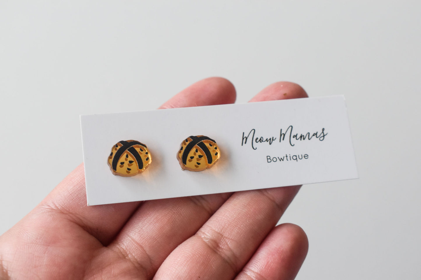 golden hot cross bun studs