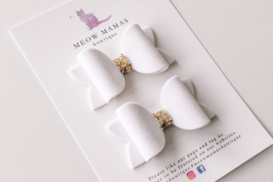 white plush pigtails