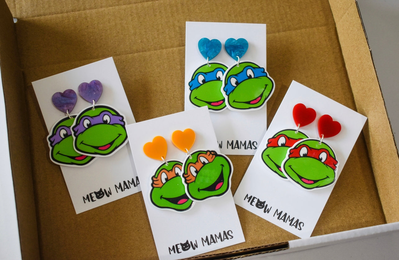 Purple turtle dangle earrings