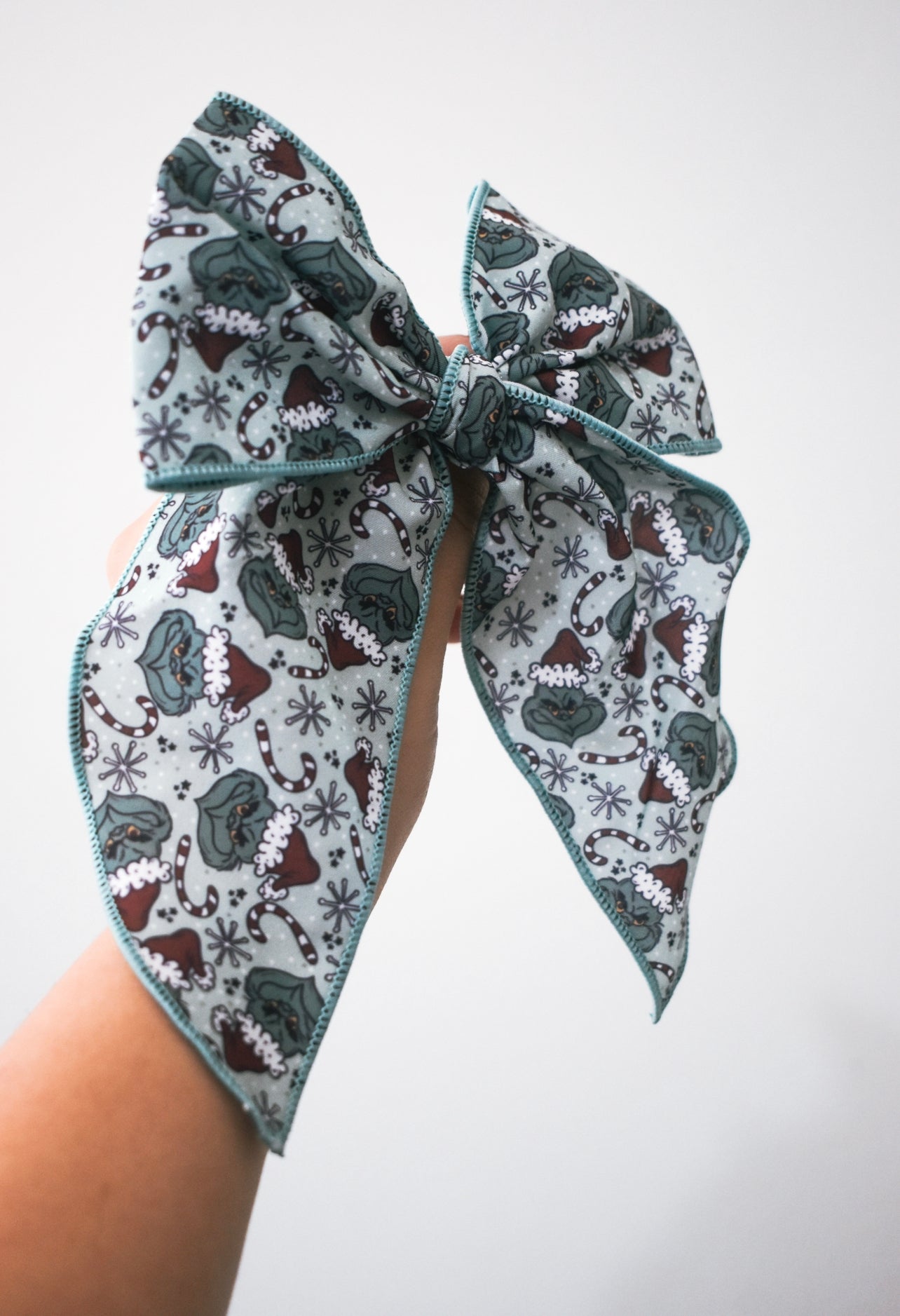 You’re a mean one 5 inch hand tied sailor bow