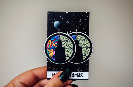 Unlikely pair dangle earrings