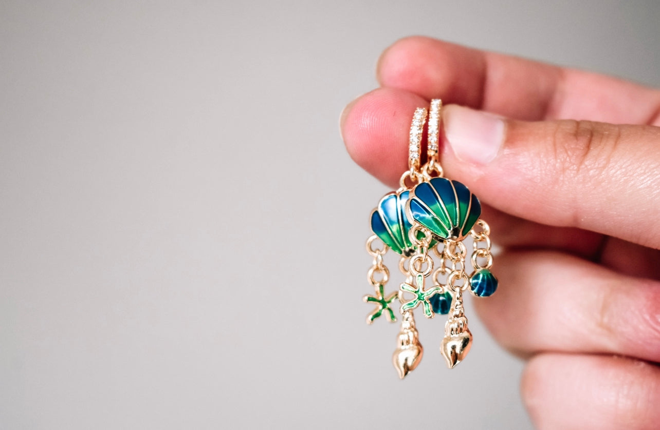 Sea shell gold plated sea shell dangle earrings