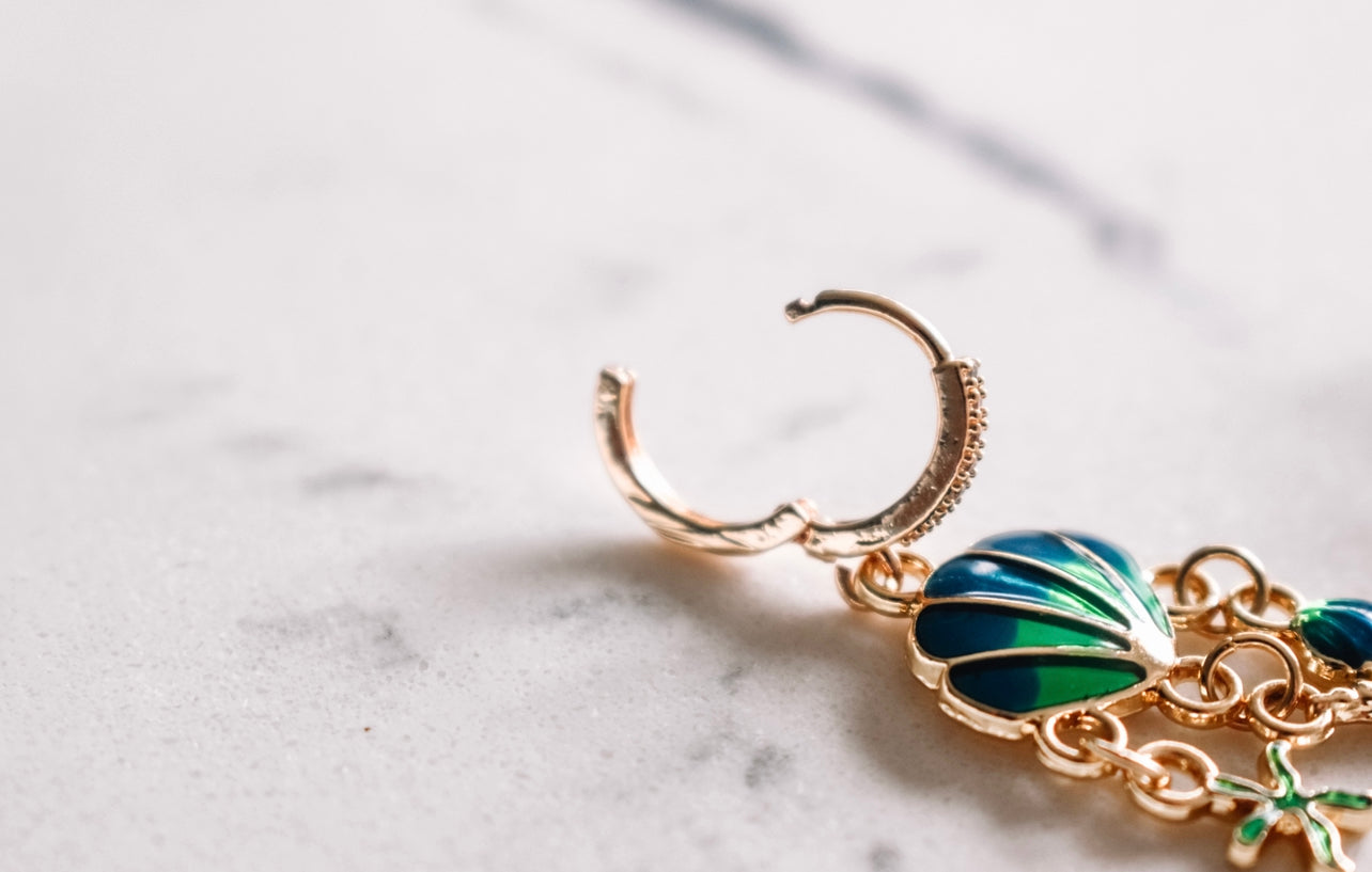 Sea shell gold plated sea shell dangle earrings