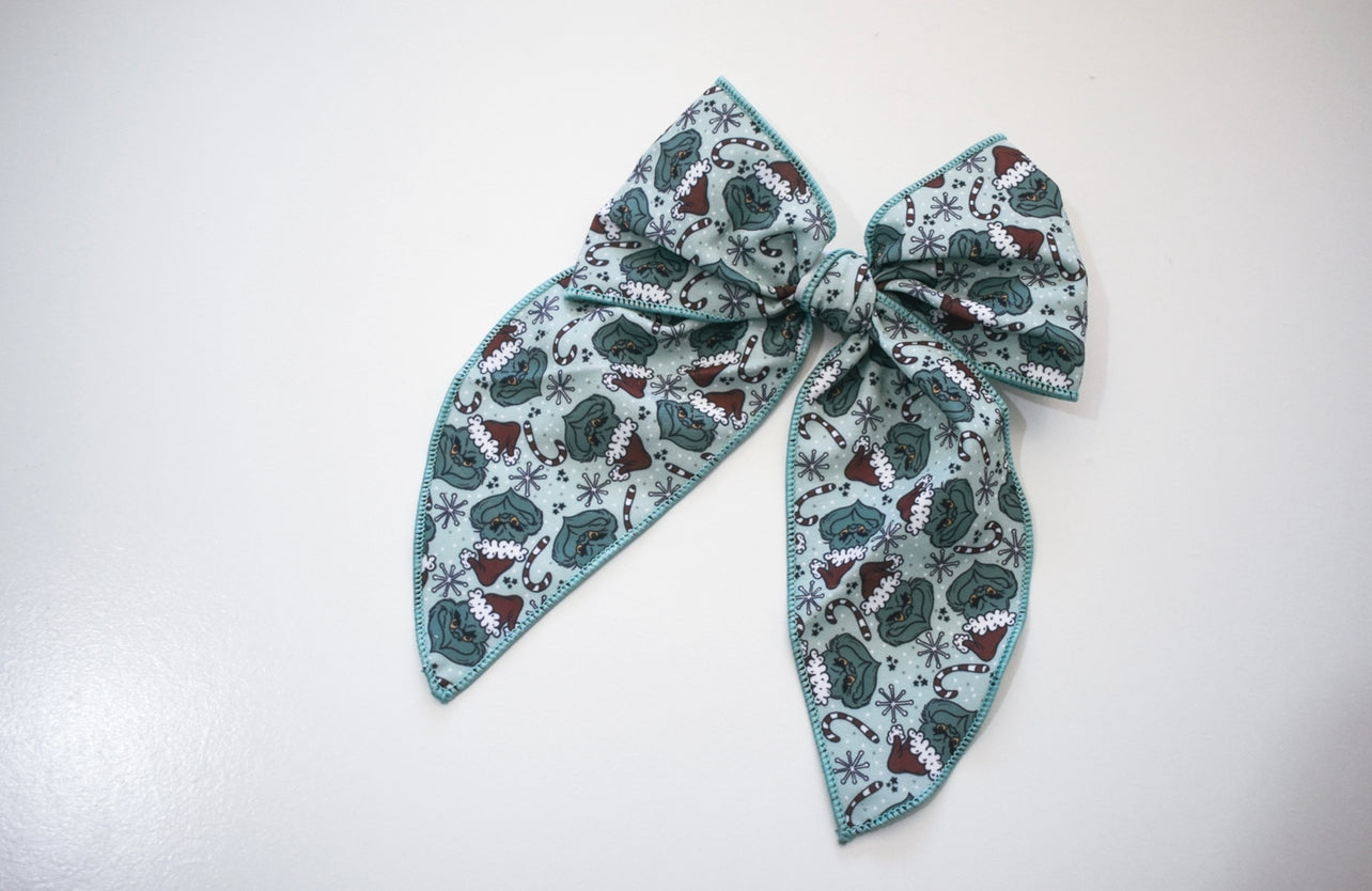 You’re a mean one 5 inch hand tied sailor bow