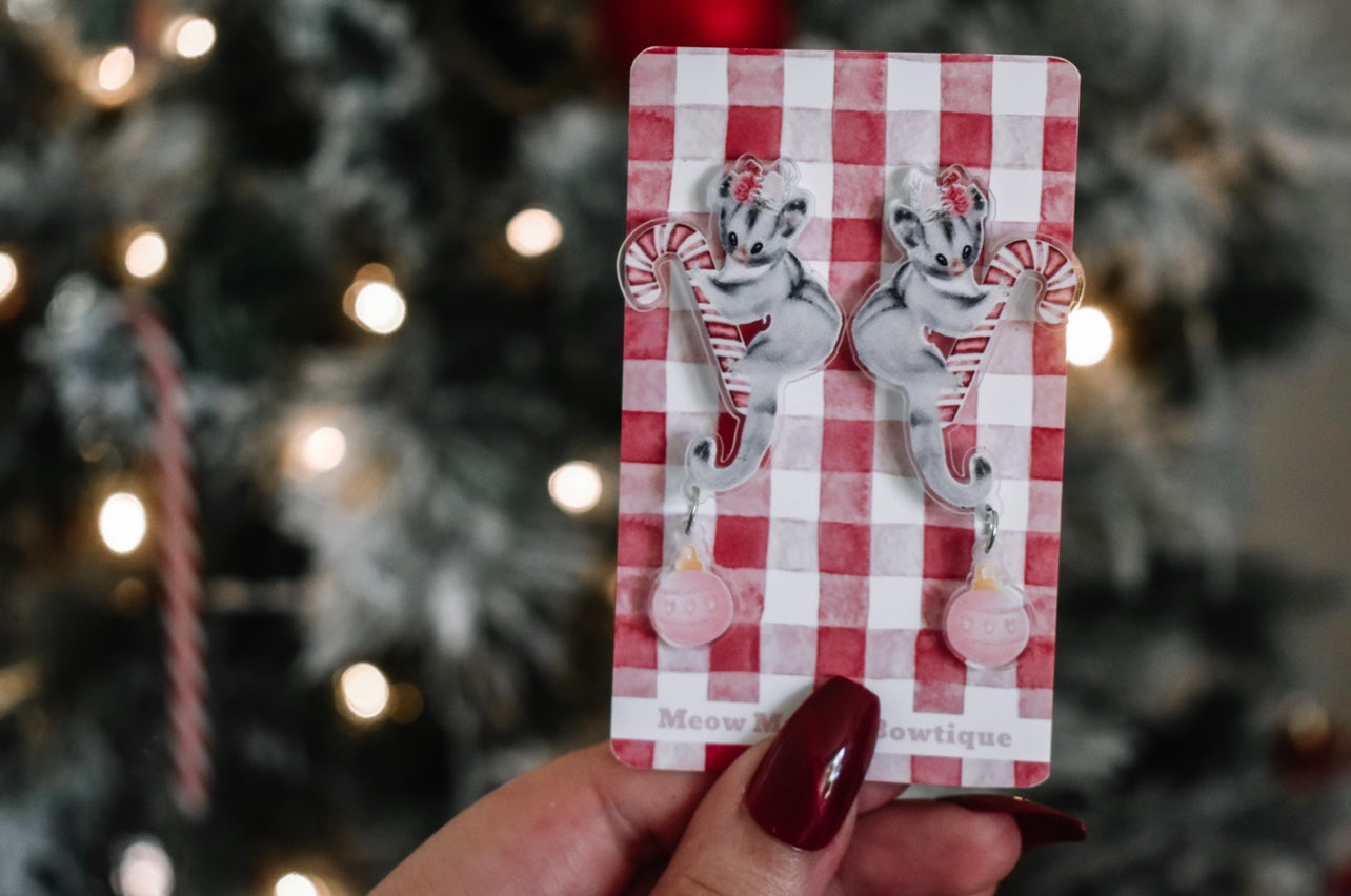 Hello possum dangles