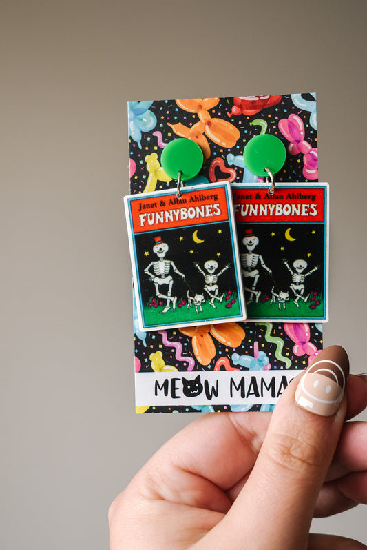 Funny bones book dangle earrings