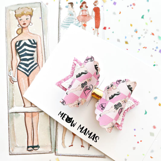 Classic swimsuit doll bow
