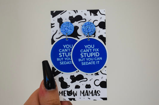 Sedate the stupid dangle earrings
