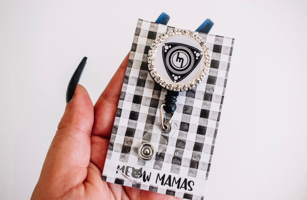 Rotary M Badge reel