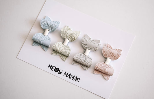 Pastel embossed  tiny bow set